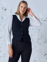 Buzo combinado de tejido fino color beige, con cuello y mangas de gasa, simulando una camisa.