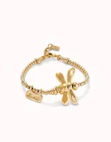 Pulsera elástica con diseño de libélula y detalles bañados en oro de 18K.