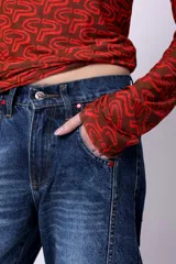 Jean slouch de denim azul, 100% algodón, de tiro medio.
