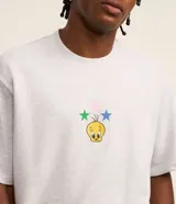 Remera gris melange de corte boxy, con cuello redondo y mangas cortas. Estampa frontal de Piolín con estrellas y texto.