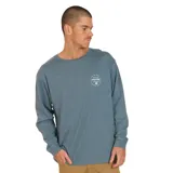 Remera de manga larga color azul con logo de Volcom estampado en el pecho.