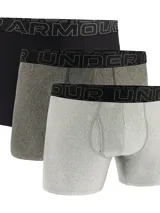 Pack de tres boxers Under Armour Tech, uno negro, uno gris oscuro y uno gris claro, con cintura elástica con el logo de la marca.