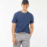 Camiseta azul de punto jacquard con cuello redondo y mangas cortas.