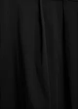 Falda midi evasé de algodón y lyocell color blanco, con tiro medio y cierre trasero invisible.