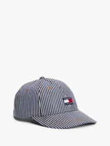 Gorra de béisbol con diseño de rayas verticales en azul y blanco, con logo de Tommy Jeans bordado en el frente.