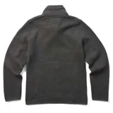Campera polar verde agua jaspeado con cuello alto y cierre frontal completo. Tiene bolsillos laterales abiertos, un bolsillo con cierre en la manga izquierda y logo de la marca en el pecho. Confeccionada con poliéster reciclado y tecnología 4-way stretch.
