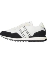 Zapatillas de running Tommy Jeans, blancas con detalles en negro.