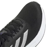 Championes Adidas Response Super negros con detalles plateados y suela blanca. Presentan las tres tiras características de la marca en los laterales y tecnología Dreamstrike en la entresuela para mayor amortiguación.