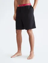 Short de pijama negro Calvin Klein Pride, con cintura elástica roja con logo "This is Love" y "Calvin Klein".