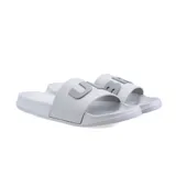 Ojotas Umbro de goma color gris claro, con logo de la marca en verde en la tira.