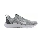 Championes de running Nike Flex Experience RN 12, color gris claro con detalles en blanco y negro.