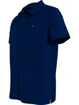 Chomba azul marino de felpa con cuello clásico, corte amplio y logo de Tommy Hilfiger bordado en el pecho.