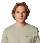 Remera de hombre Columbia color verde claro jaspeado, de corte clásico, manga corta y cuello redondo. Cuenta con tecnología Omni-Shade™ UPF 50 para protección solar y Omni-Wick™ para absorción de la humedad.