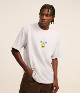 Remera gris melange de corte boxy, con cuello redondo y mangas cortas. Estampa frontal de Piolín con estrellas y texto.