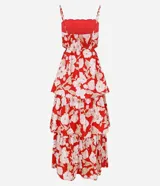Vestido midi evasé con breteles finos ajustables, escote recto, recortes abiertos laterales, capas superpuestas en volados y estampa floral.