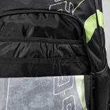 Mochila Rip Curl modelo Ozone Cool 30L Blocker, color negro con estampado sutil y detalles en color lima fluorescente. Presenta el logo vertical de Rip Curl en el frente y un compartimento principal con cierre.
