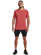 Short deportivo Under Armour Vanish Elite 2in1 para hombre, color negro, con calza interior ajustada y short exterior holgado con bolsillos laterales.