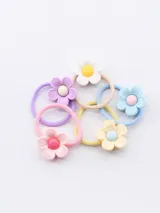 Pack de cinco gomitas de pelo con adorno de flor de plástico en colores pastel: rosa, lila, celeste, amarillo y blanco.