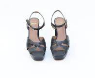 Sandalias negras de cuero con plataforma de 2,5 cm y taco forrado de 10 cm.