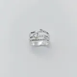 Anillo de plata 925 satinada con tres hileras y tres circonias engarzadas.