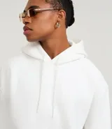 Hoodie masculino de algodón con felpa, color azul marino, de corte relaxed, con capucha ajustable, bolsillo canguro y manga larga.