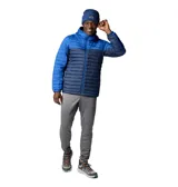 Campera Columbia con capucha, color verde oliva en la parte superior y gris claro en la parte inferior. Cuenta con cierre frontal, bolsillos laterales con cierre y logo de la marca en el pecho.