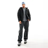 Campera puffer negra The North Face Aconcagua 3 con interior polar y corte regular.