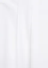 Falda midi evasé de algodón y lyocell color blanco, con tiro medio y cierre trasero invisible.