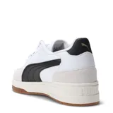 Championes urbanos Puma Shuffle Downtown, color negro con detalles en blanco y suela marrón.