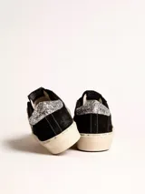 Zapatillas Golden Goose modelo Hi Star, color negro con estrella blanca y detalles plateados con glitter.