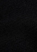 Minifalda negra de tweed con cierre trasero invisible.