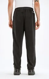 Pantalón de jogging negro de lino con calce regular, cintura elástica con cordón ajustable y bolsillos ribeteados en el delantero.