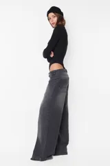 Body negro de morley con cuello alto, manga larga y broches en la entrepierna.