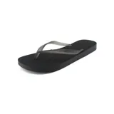 Ojotas negras de goma con tiras finas traslúcidas.