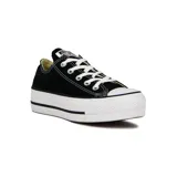 Championes Converse Chuck Taylor de lona negra con plataforma blanca y cordones blancos.