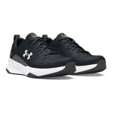 Calzado deportivo Under Armour Charged Edge para hombre, color negro con detalles en gris oscuro y entresuela blanca. Presenta el logo de Under Armour en blanco en el lateral y la inscripción "CHARGED" en la entresuela.