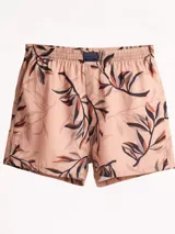 Bóxer de algodón liviano, color rosa pálido, con estampado de hojas en tonos oscuros y terracota. Presenta cintura elastizada.