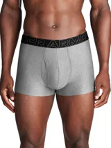 Pack de tres bóxers Under Armour Performance Tech Solid, uno negro y dos grises, con cintura elástica con el logo de la marca.