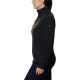 Buzo polar celeste de mujer, con cuello alto y cierre de media cremallera.
