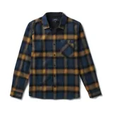 Camisa de franela a cuadros azul, ocre y negro, de manga larga, con cuello clásico, cierre frontal con botones, bolsillo de parche en el pecho y corte recto.