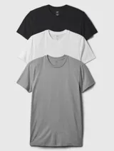 Pack de tres camisetas Gap de algodón, con cuello redondo y manga corta. Incluye una camiseta negra, una blanca y una gris.