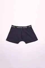 Boxer azul marino con cintura elástica negra con la inscripción "URBAN HAUS" en blanco.