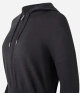 Campera corta de mujer con capucha ajustable con cordón, cierre frontal de cremallera y puños y bajo ajustados. Confeccionada en tejido de punto.