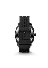 Reloj Fossil Machine con caja de acero negra de 45mm y correa de silicona negra. Cuenta con movimiento de cuarzo cronógrafo, función de cronómetro y fecha. Esfera negra protegida por cristal mineral resistente y resistencia al agua de 5 ATM.