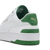 Championes Puma CA Match blancos con detalles en verde.