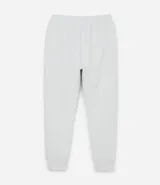 Pantalón deportivo de hombre color beige, liso, con ajuste elástico en la cintura y bolsillos laterales.