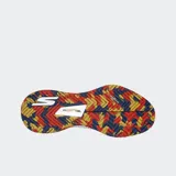 Championes Skechers Viper Court Pro blancos con detalles en azul, rojo y amarillo.