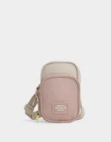 Portacelular bicolor rosa y beige con bolsillo frontal y correa regulable.
