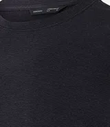 Remera de algodón color ladrillo, corte slim fit, cuello redondo y mangas cortas.