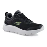 Championes deportivos Skechers Go Walk Flex Independent, color negro con detalles en gris y logo verde neón. Capellada de malla y material sintético, plantilla Air-Cooled Goga Mat, amortiguación Ultra Go y suela flexible.